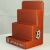 Socle 3 NM Miner vide vu de trois quarts - logo Bitcoin gravé sur le flanc