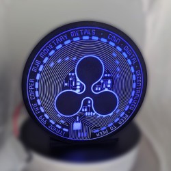 Enseigne Ripple lumineuse allumée - halo bleu autour du logo Ripple gravé en 3D