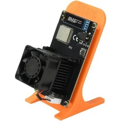 Bitaxe 601 monté sur son support orange - vue de trois quarts de la carte et du ventilateur