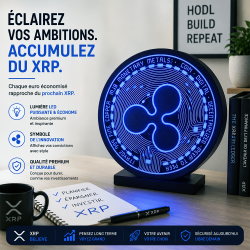 Enseigne Ripple lumineuse en situation - disque LED bleu au logo XRP posé sur un bureau