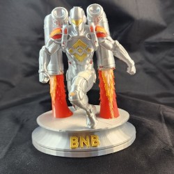 Rocketman BNB vu de face - réacteurs orange et socle doré gravé BNB