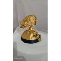 Détail du feuillage doré de la statuette racines de toutes les cryptomonnaies