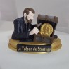 Le Trésor de Strategy de face, plaque gravée sur le socle doré